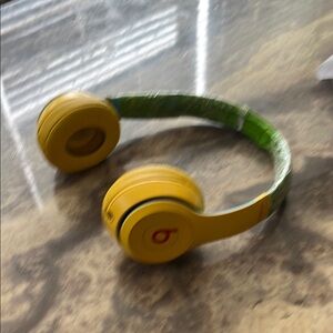 Beats Yellow and Green tape headphones